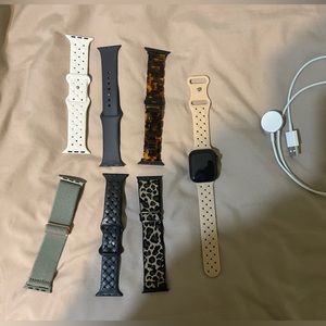 Apple Watch Series 7 (No GPS) 41 mm with 7 small bands. In great condition!